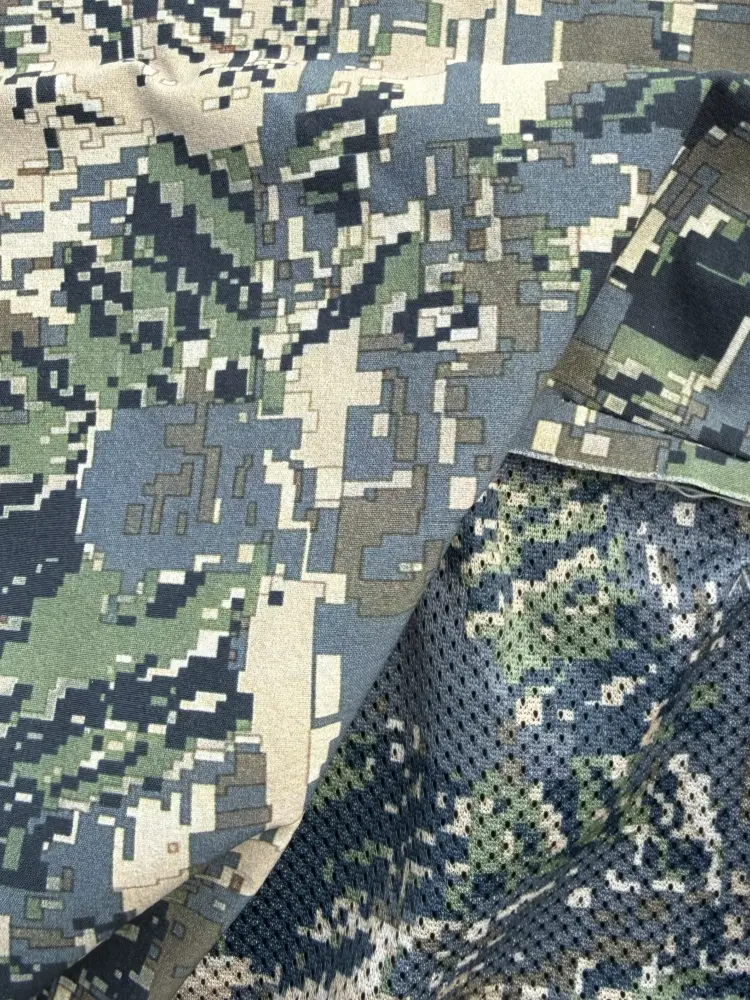 Printed woven fabric showing coordinated digital and patterned printing development