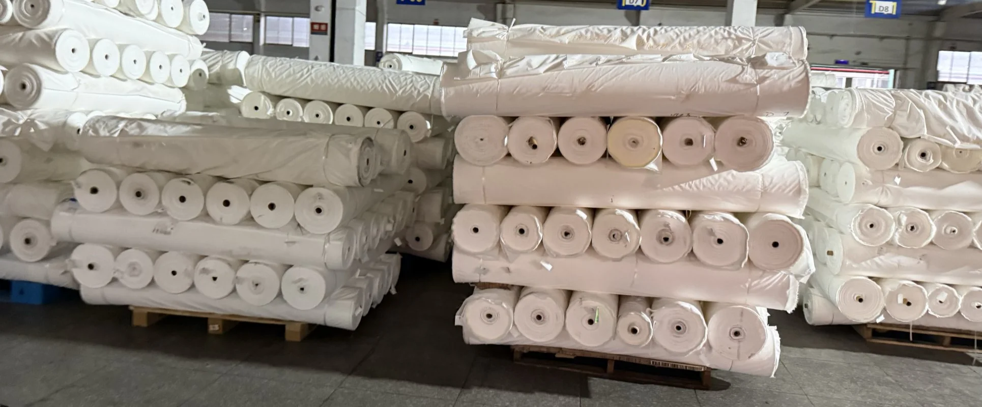 Nylon and polyester outdoor jacket fabrics compared by weave, weight and finishing